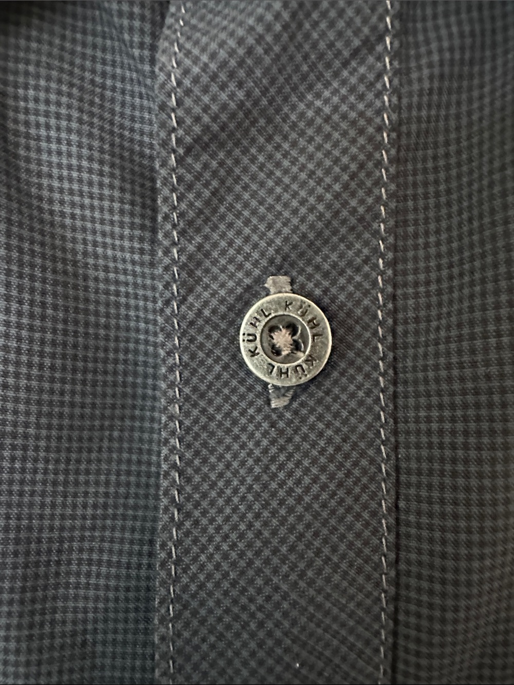 Kuhl Men's Short-Sleeve Button-Down Shirt in Navy with Plaid Lining - Picture 4 of 10